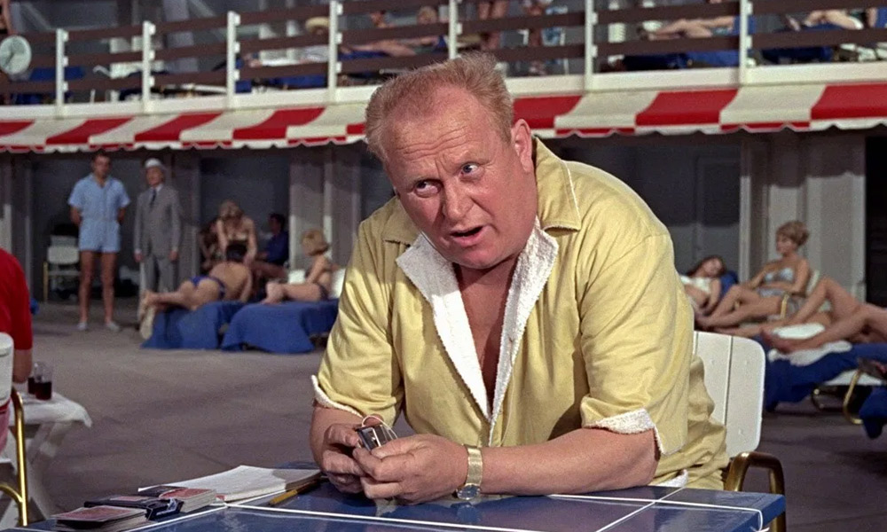 Auric Goldfinger plays cards