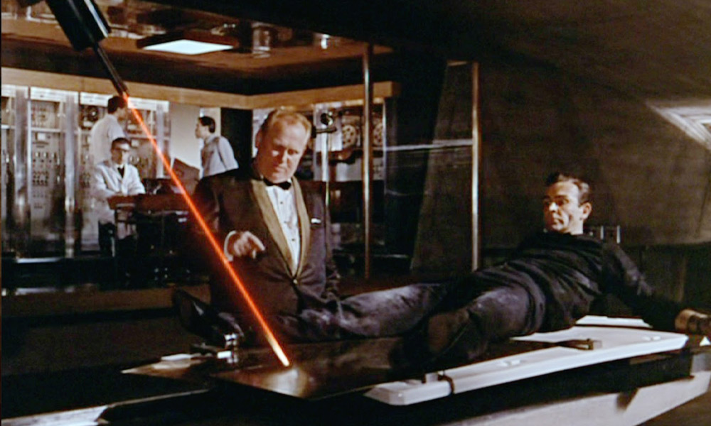 Goldfinger tries to kill James Bond with a laser