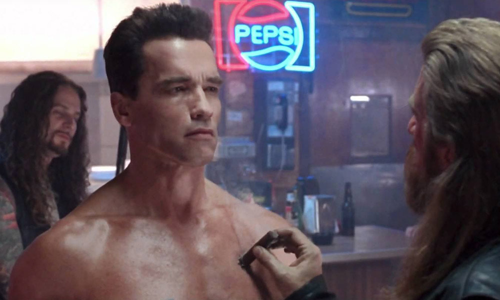 Cigar stubbed out on T-800 (Arnold Schwarzenegger) in Biker Bar in Terminator 2 Judgment Day