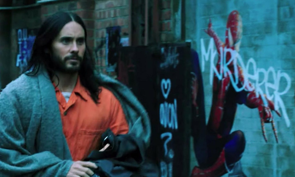 Jared Leto walks past Spider-Man graffiti in Morbius